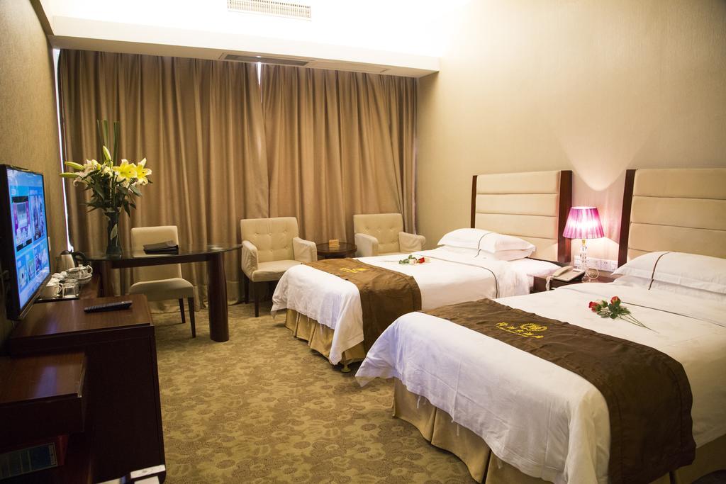 Long Zhou Grand Hotel Guangzhou Room photo