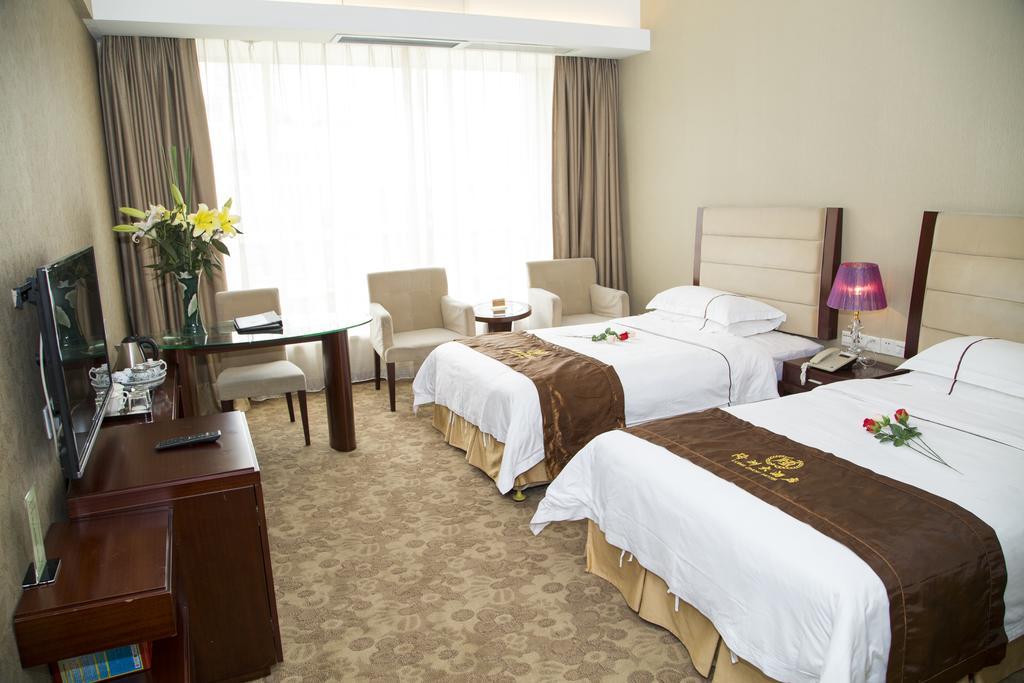Long Zhou Grand Hotel Guangzhou Room photo
